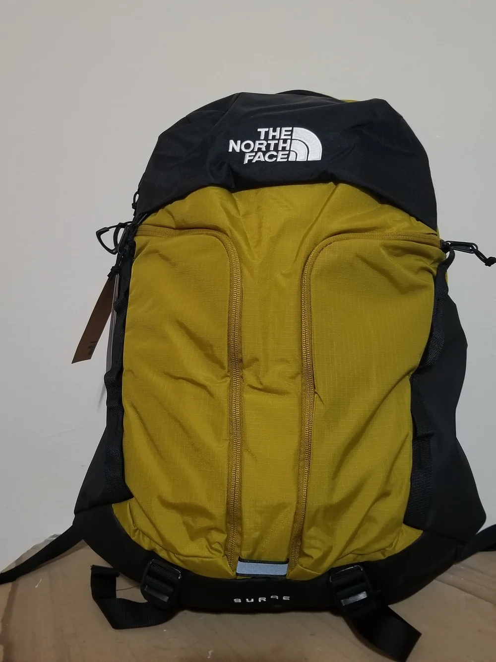 NEW! The North Face Surge Backpack in Deep Dijon and Black NWT